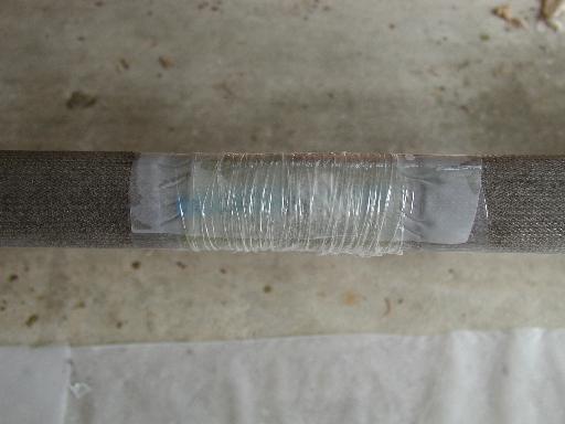 Taped polyethylene sheet smoothing transitions between glass and reinforcement