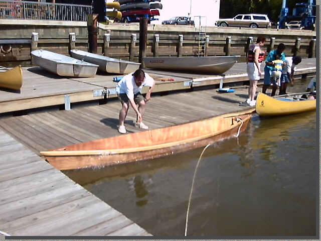 Johncanoe splashing into the Anacostia River
