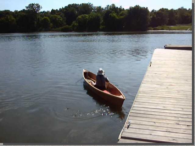 Johncanoe maneuvering by the dock